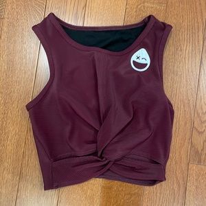 Purple sports bra with rumble logo